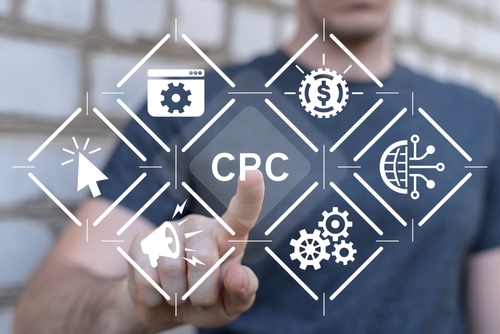 A man touching the screen tapping on cpc illustrating the importance of the cpc in your law firm ads and other digital efforts.