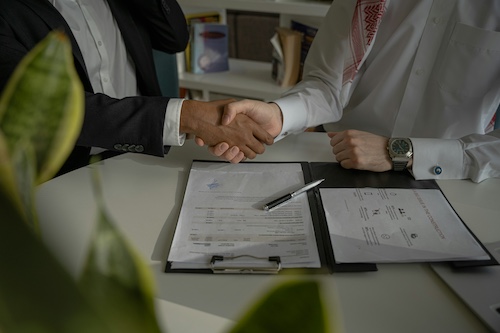 Attorney and Client Shaking Hands - Marketing Channel