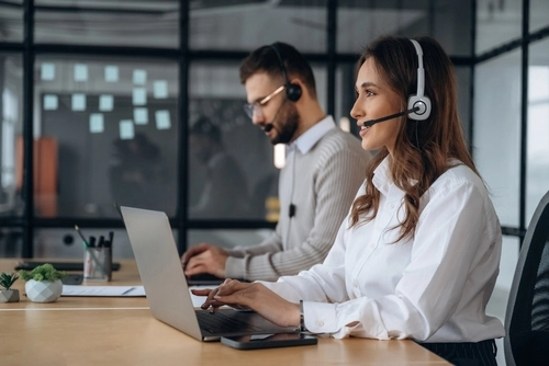 A legal intake services team answers phone calls for law firms.