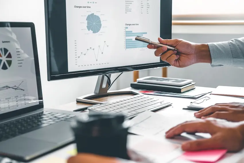 SEO specialist conducting a website audit for a personal injury law firm showing keyword rankings and analytics