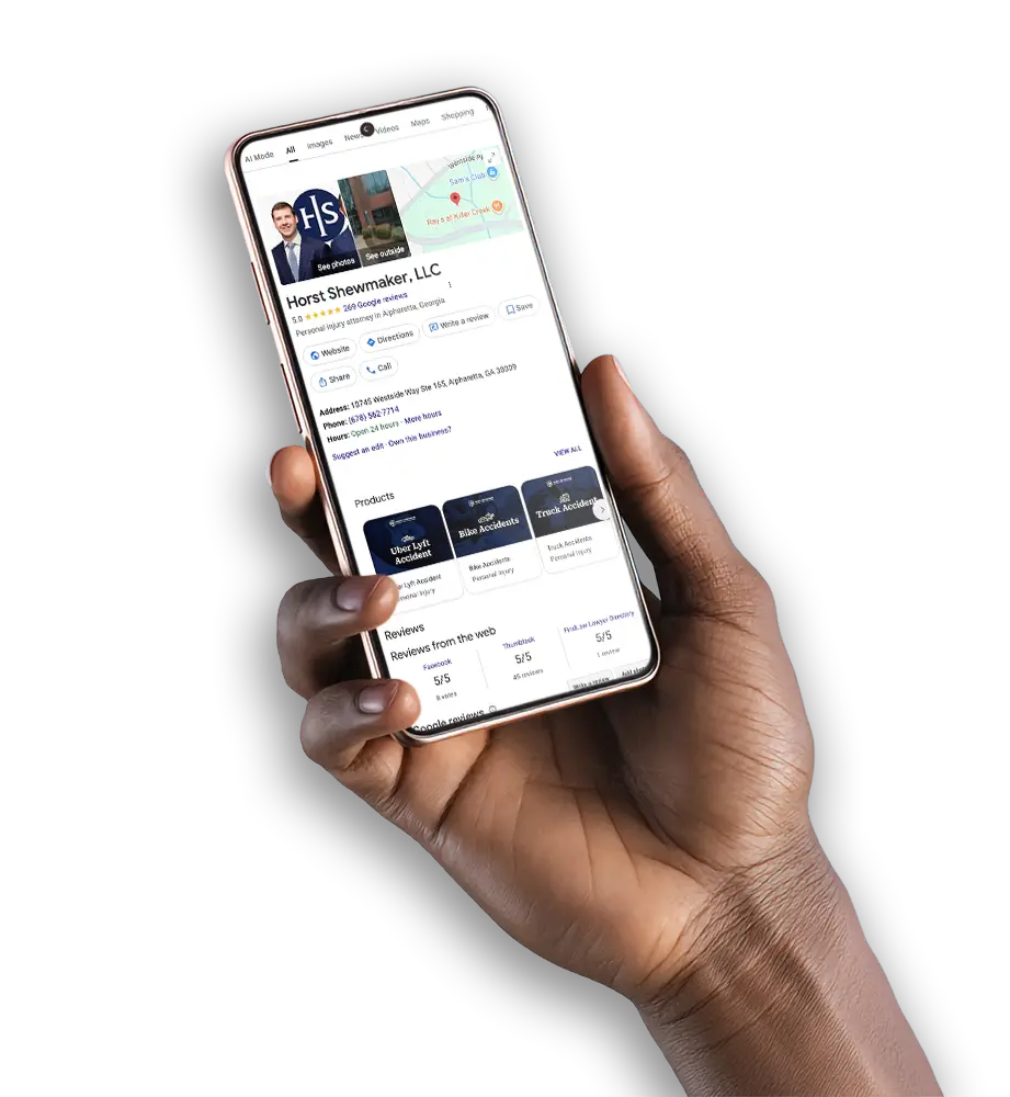 hand holding a phone with a Google Business Profile