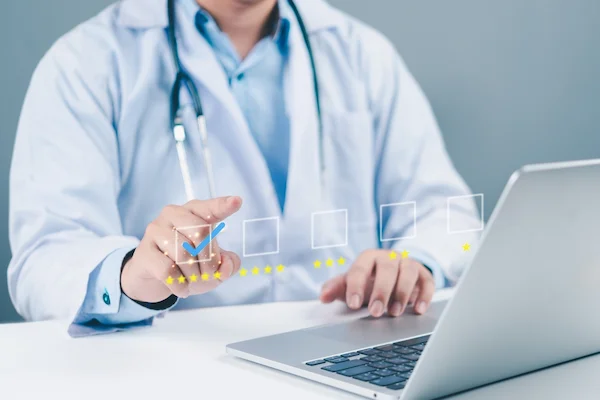 A doctor reading online reviews shows SEO for medical practices.
