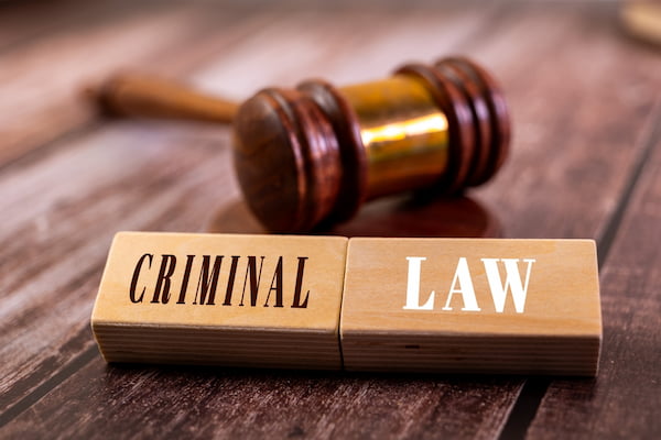 A gavel and the words criminal law represent SEO for criminal defense lawyers